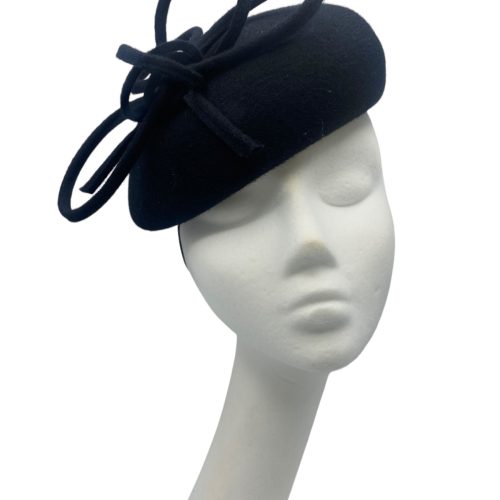 Stunning black felt beret with twist knot detail to the top.